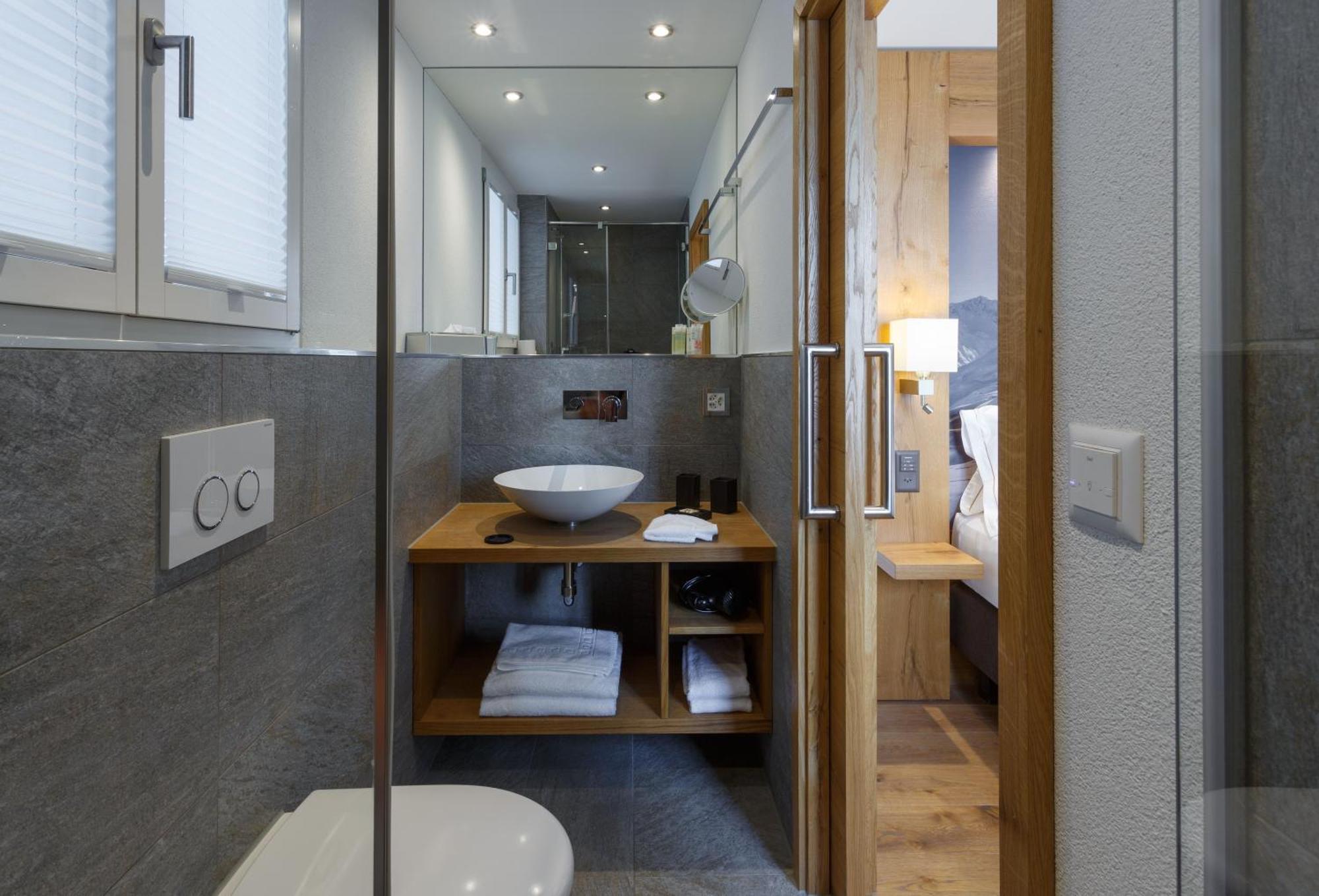 Hotel Crown Andermatt Rum bild